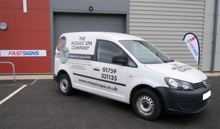 Passenger Side of The Mosaic Spa Company Van